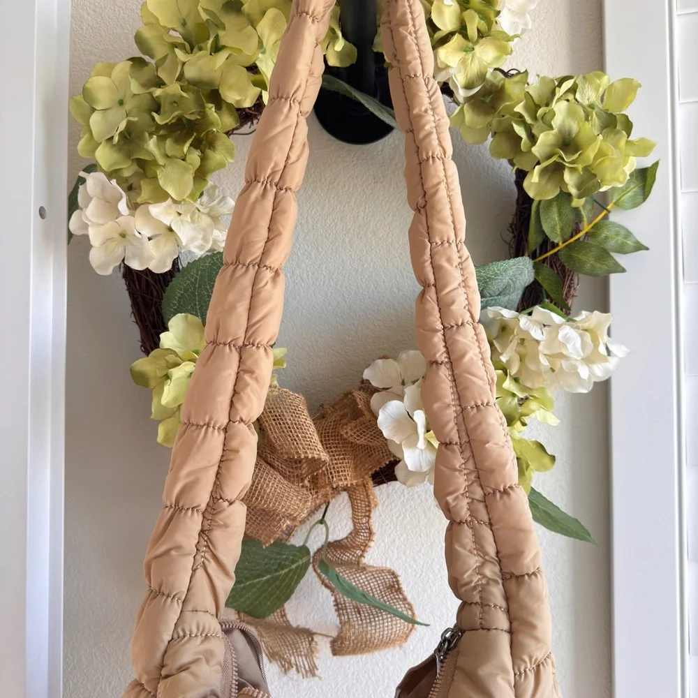 Boutique. Tan Quilted Hobo Bag